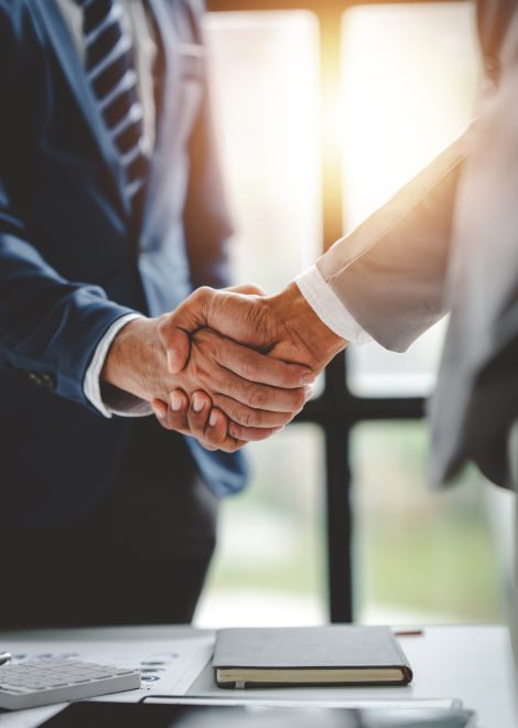 business partner handshake concept Colleagues shaking hands Successful deal after a great meeting. Blurred background. business partner handshake concept Colleagues shaking hands Successful deal after a great meeting. Blurred background.